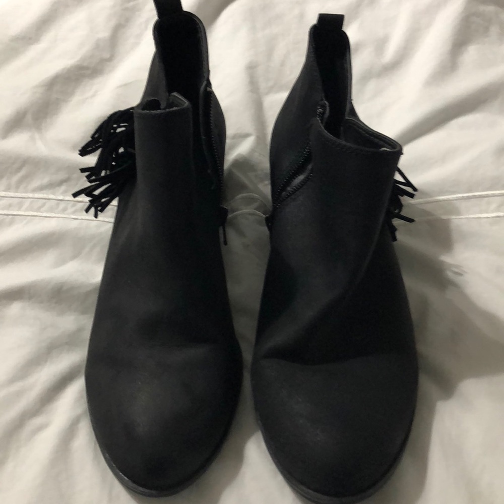 Black booties with tassels